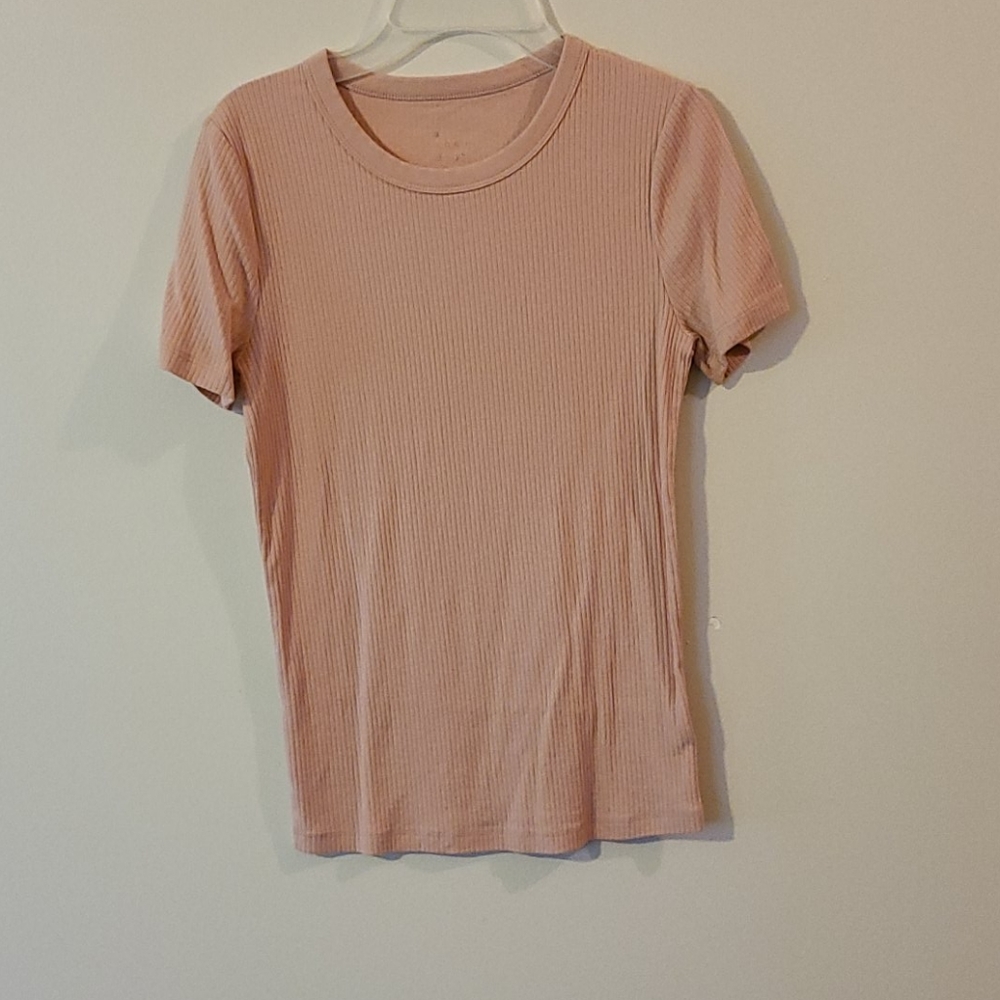 Super cute pastel pink short sleeve shirt.